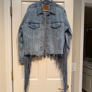 Levi's Light Blue Denim Jacket with Long Fringe
So fun.  Great condition large